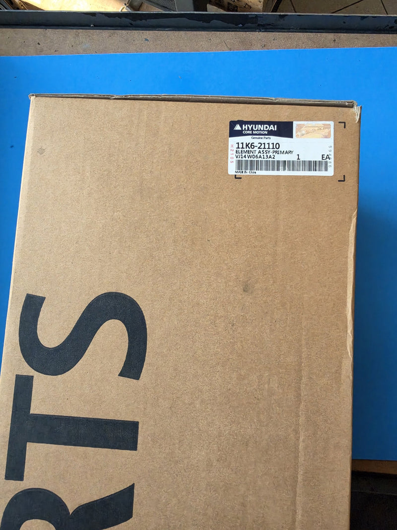 Genuine Hyundai 11K6-21110 primary air cleaner element in the original Hyundai Core Motion genuine parts box