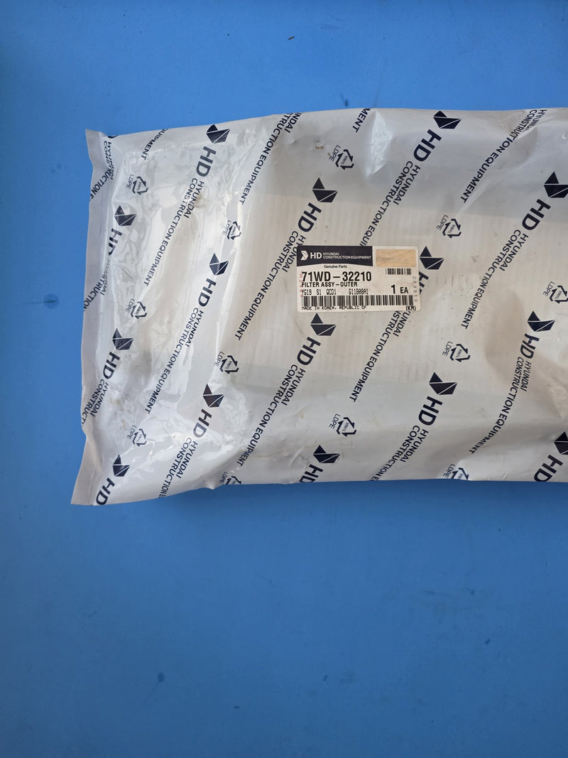 HD Hyundai 71WD-32210 filter assy outer sealed in a Hyundai Construction Equipment genuine parts bag made in Korea