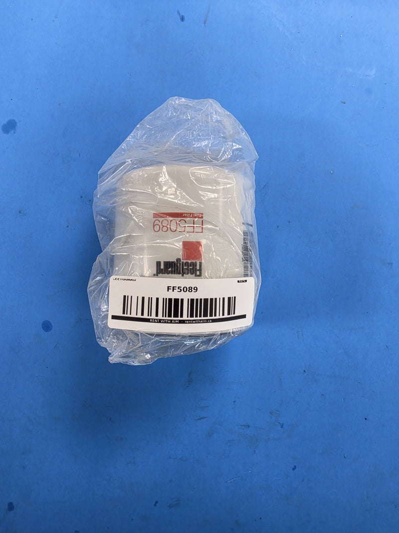 Genuine Fleetguard FF5089 spin-on fuel filter sealed in the original Cummins Filtration bag