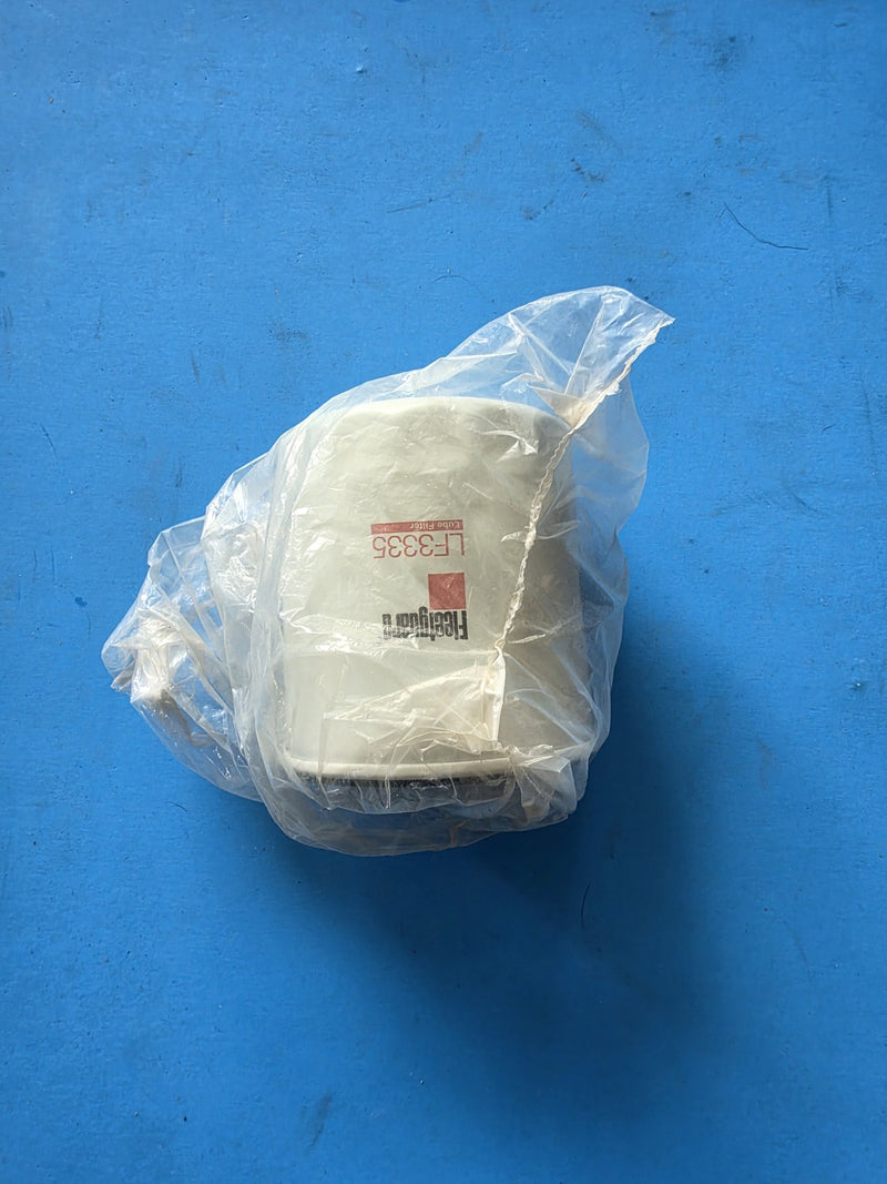 Genuine Fleetguard LF3335 lube filter bagged in clear poly on the bench in Prince George BC