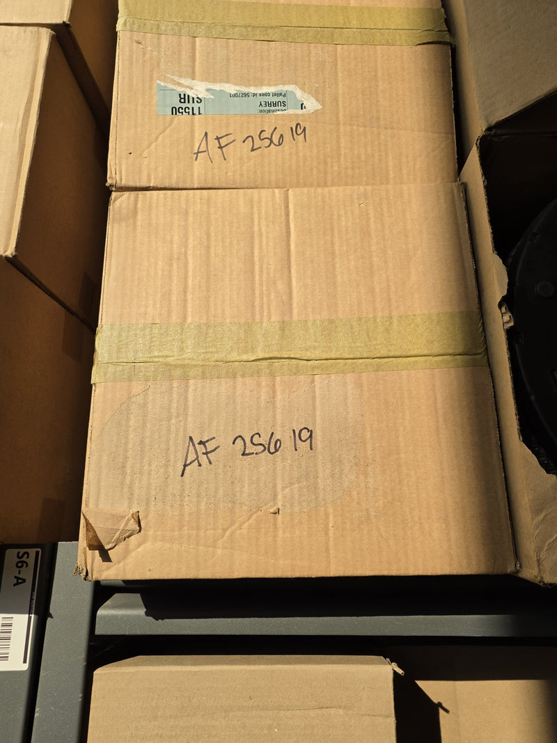 Fleetguard AF25619 air filter in a plain taped carton with AF 25619 written twice in marker, remnant Surrey freight label, photographed on rack S6-A in Prince George BC
