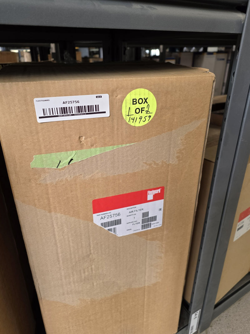 Genuine Fleetguard AF25756 air filter carton marked BOX 1 OF 2 in yellow marker, origin France, AIM S4-E shelf sticker, photographed in Prince George BC