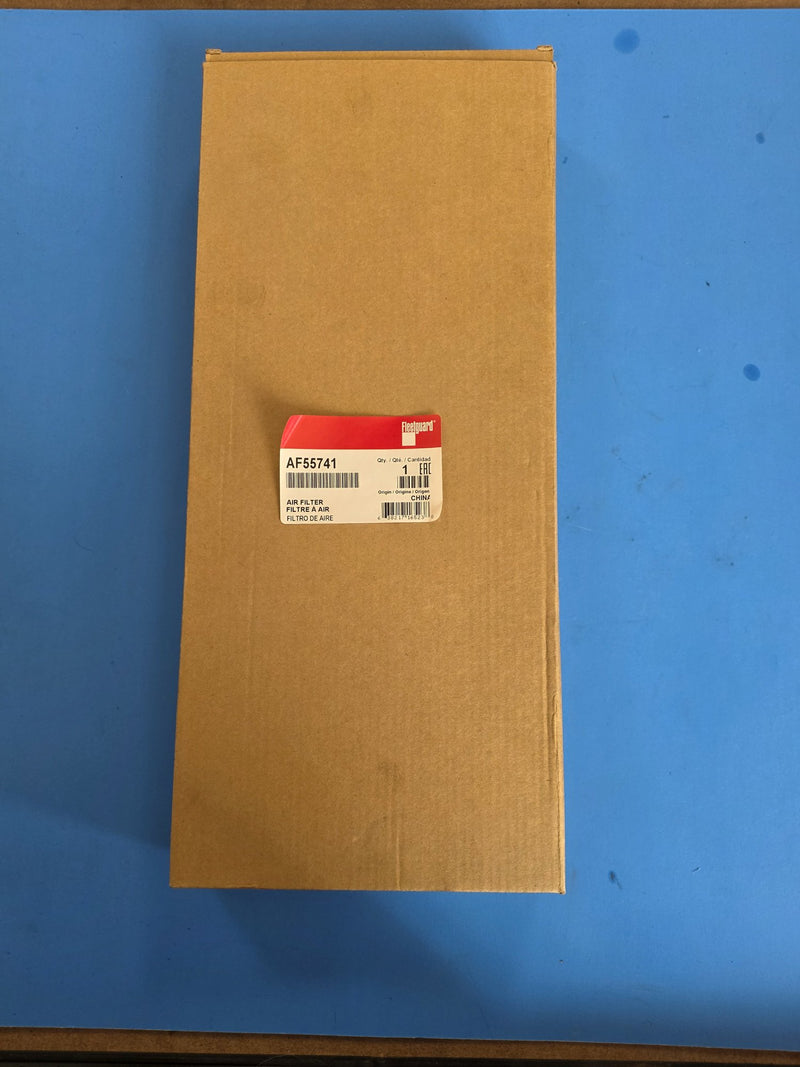 Genuine Fleetguard AF55741 air filter in its sealed tall carton, red Fleetguard label reading AIR FILTER, origin China, photographed on the bench in Prince George BC