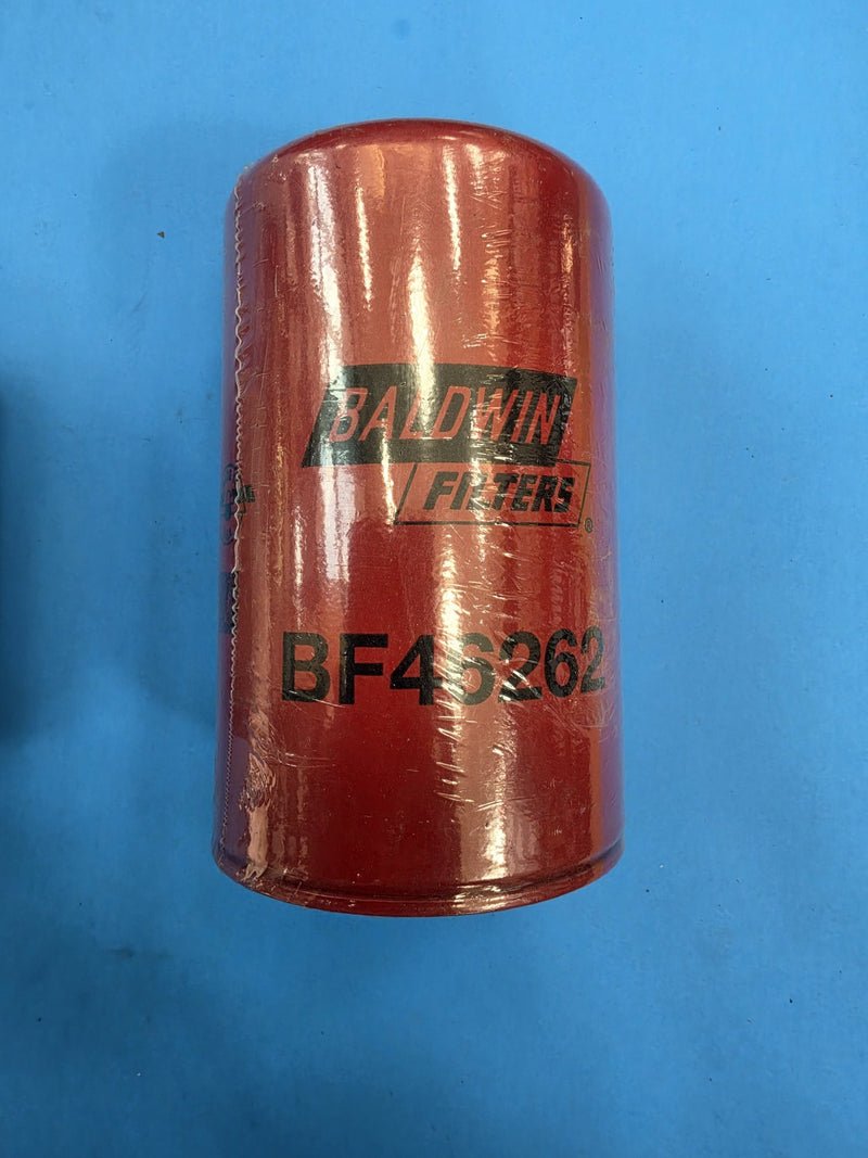 Genuine Baldwin BF46262 red spin-on fuel filter on the Prince George BC shelf