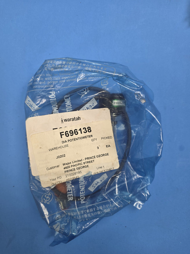Waratah F696138 Hall effect diameter potentiometer, Sakae rotary sensor sealed inside a Waratah pick ticket bag, warehouse J0202, quantity 3, photographed on the shelf in Prince George BC