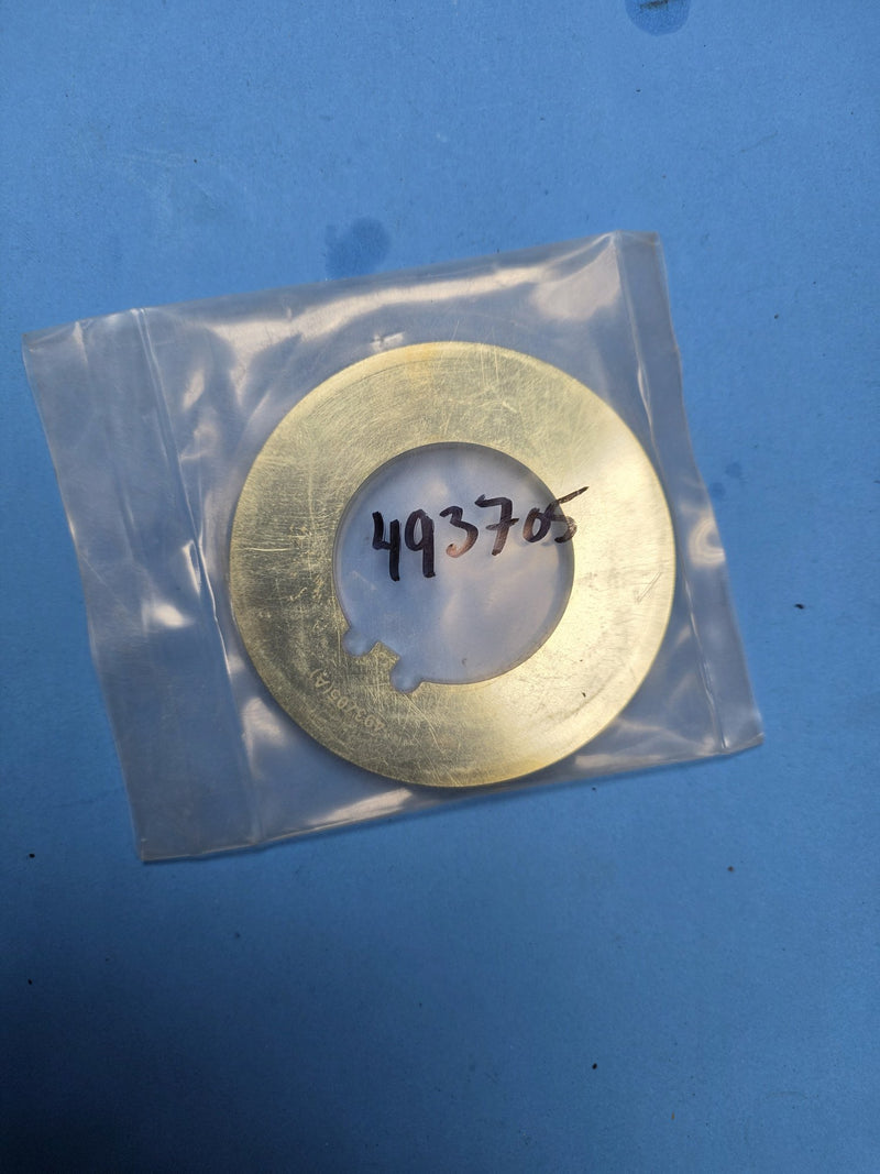 Hand written 493705 bag holding a brass thrust washer on the Prince George BC shelf