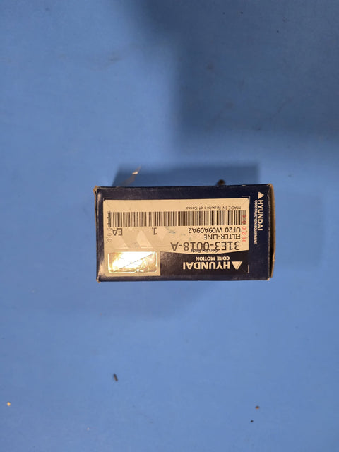 Genuine Hyundai 31E3-0018-A hydraulic pilot line filter on Prince George BC shelf