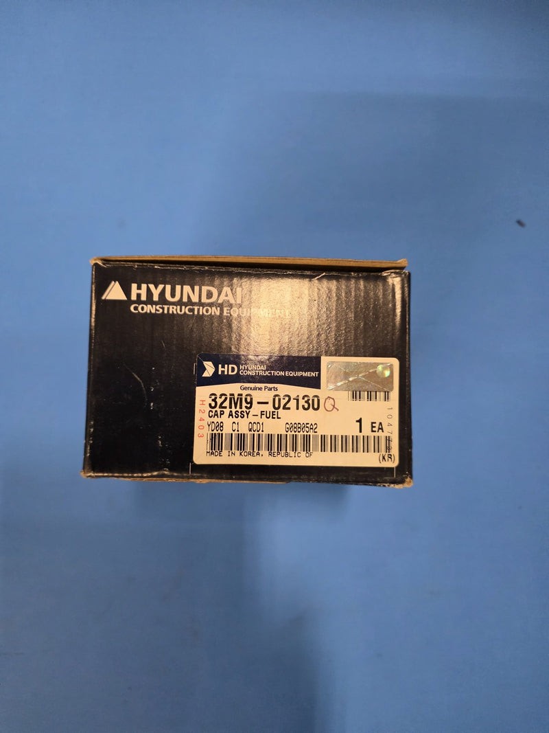 Genuine HD Hyundai 32M9-02130 fuel tank cap assembly with hologram on Prince George BC shelf