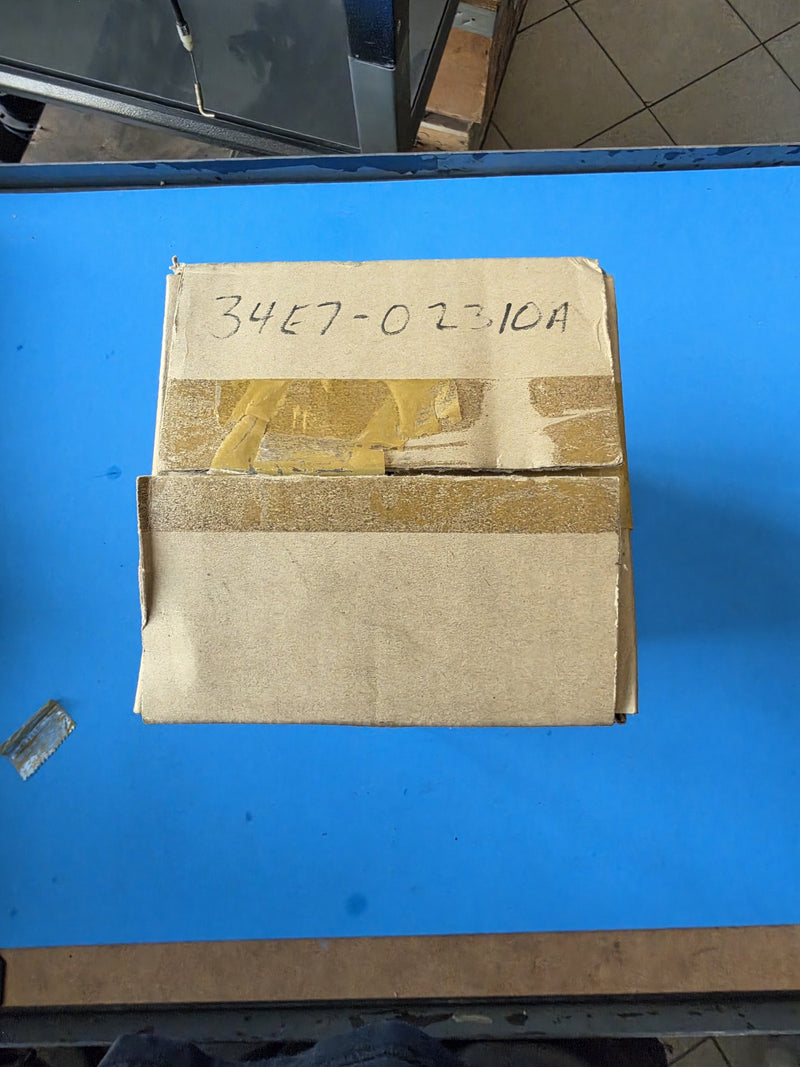 Plain kraft carton with the part number 34E7-02310A written on it by hand
