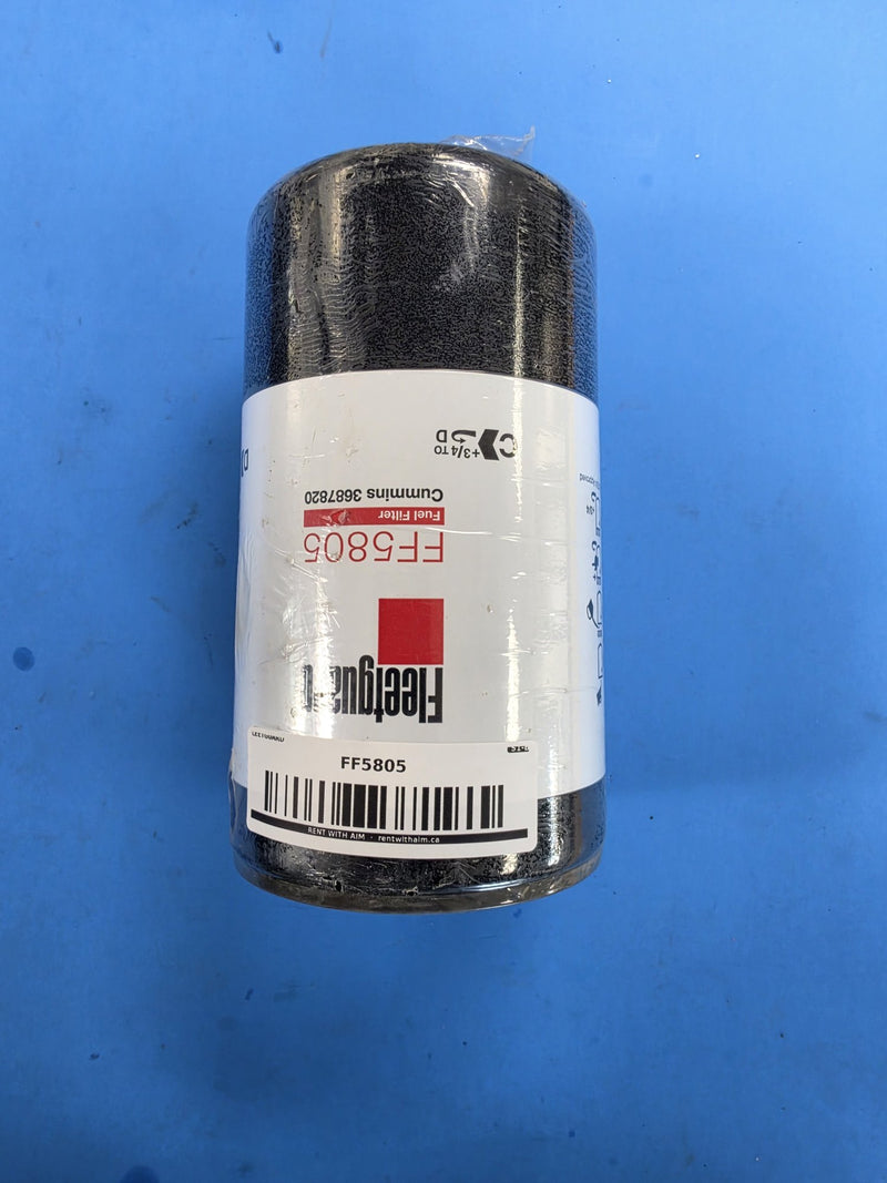 Genuine Fleetguard FF5805 fuel filter in a black can marked Cummins 3687820