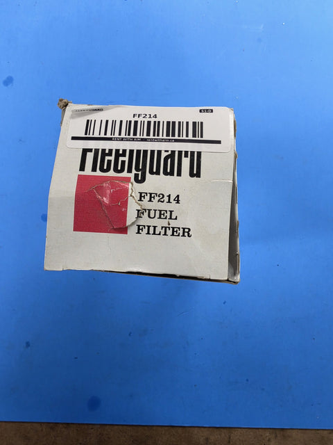 Genuine Fleetguard FF214 fuel filter in an older style Fleetguard box marked FF214 FUEL FILTER