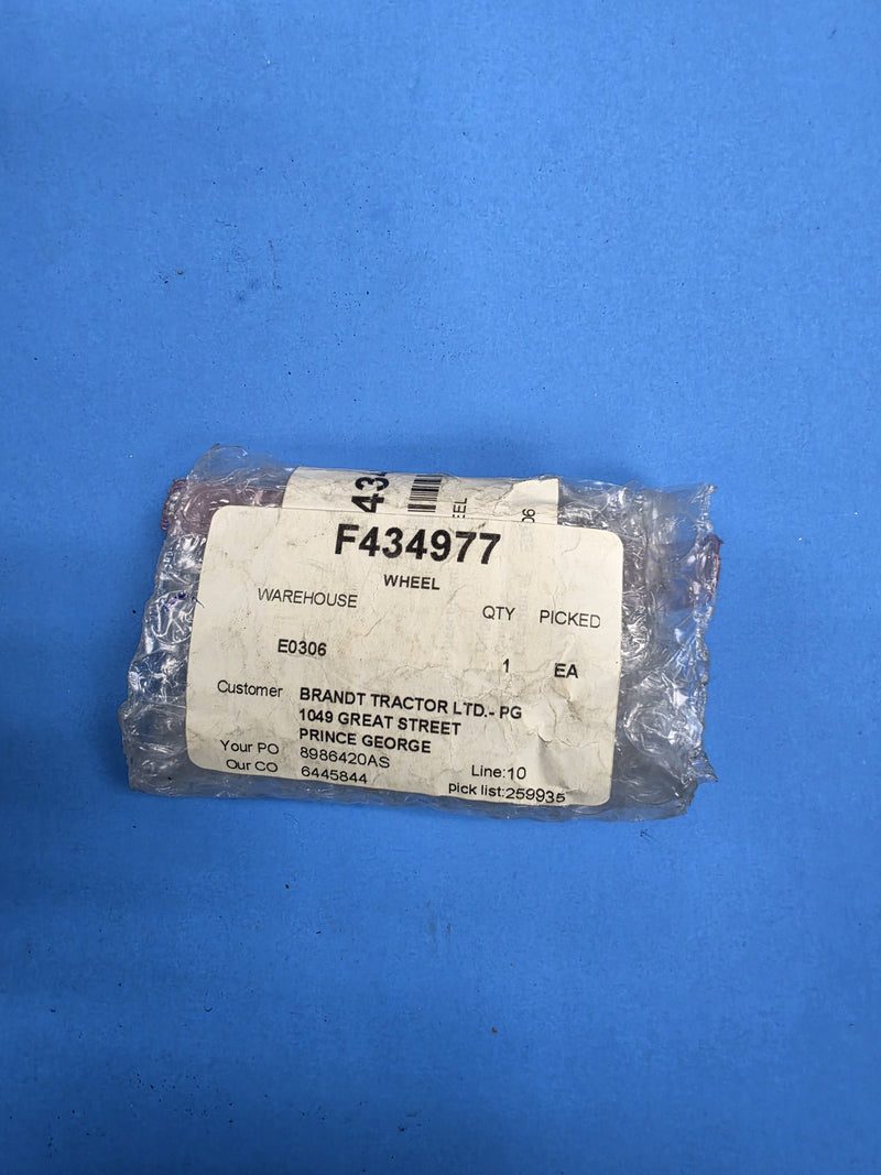 Bag labelled F434977 WHEEL on the shelf at AIM Rentals Prince George