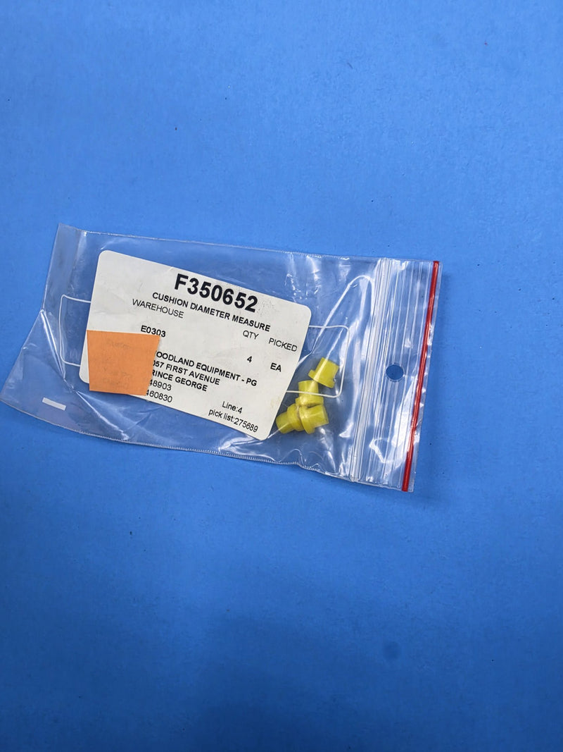 Yellow tipped cushions in a bag labelled F350652 CUSHION DIAMETER MEASURE at AIM Rentals Prince George