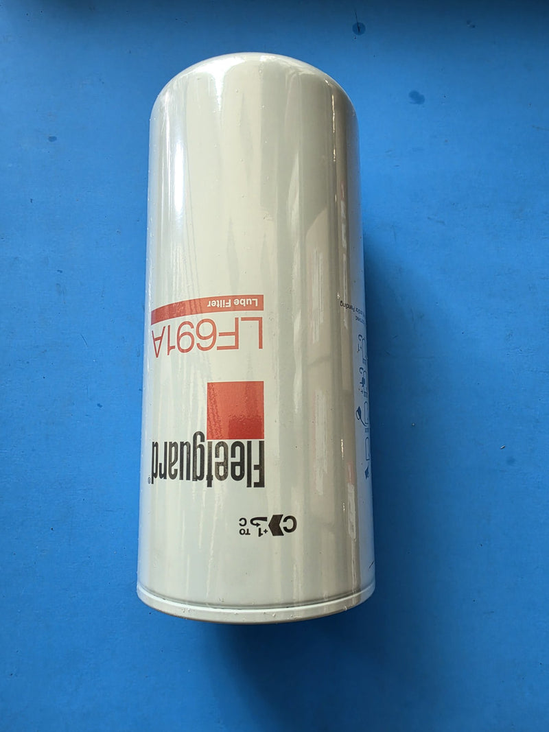 Genuine Fleetguard LF691A lube filter, tall unwrapped can with the red Fleetguard band, on the bench in Prince George BC