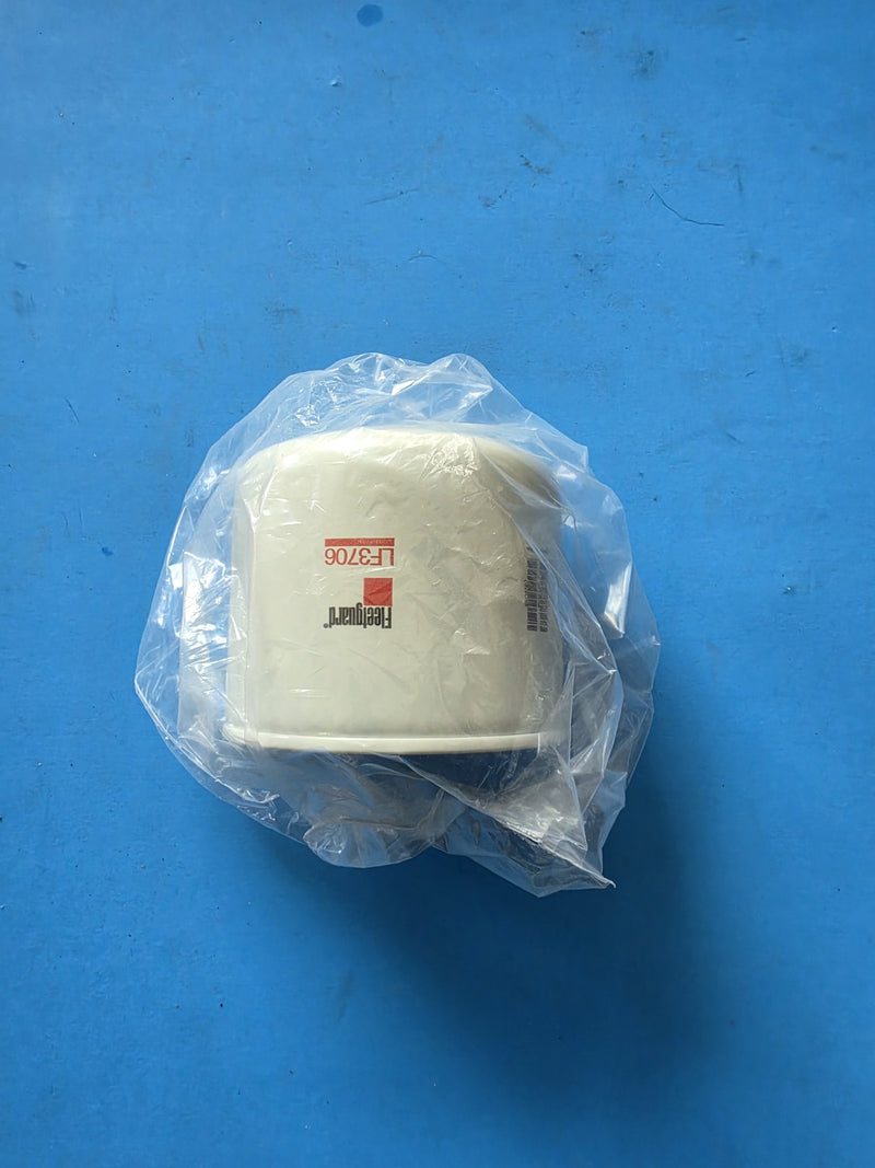 Genuine Fleetguard LF3706 lube filter bagged in clear poly, short spin on can, Prince George BC shelf stock
