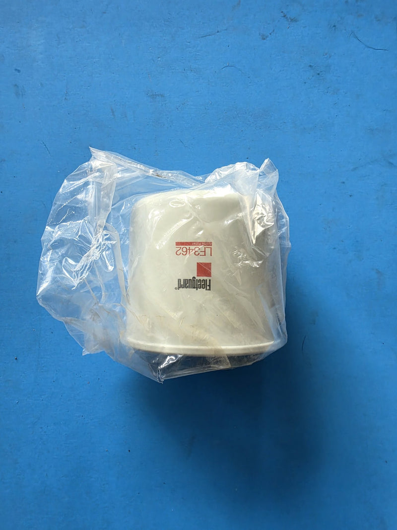 Genuine Fleetguard LF3462 lube filter in a clear poly bag, short can, photographed in Prince George BC