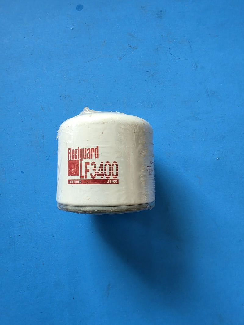 Genuine Fleetguard LF3400 lube filter, older style graphics, shrink wrapped, photographed in Prince George BC