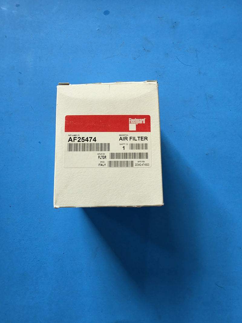 Genuine Fleetguard AF25474 air filter in a sealed carton, red Fleetguard label reading AIR FILTER with origin Italy, photographed in Prince George BC