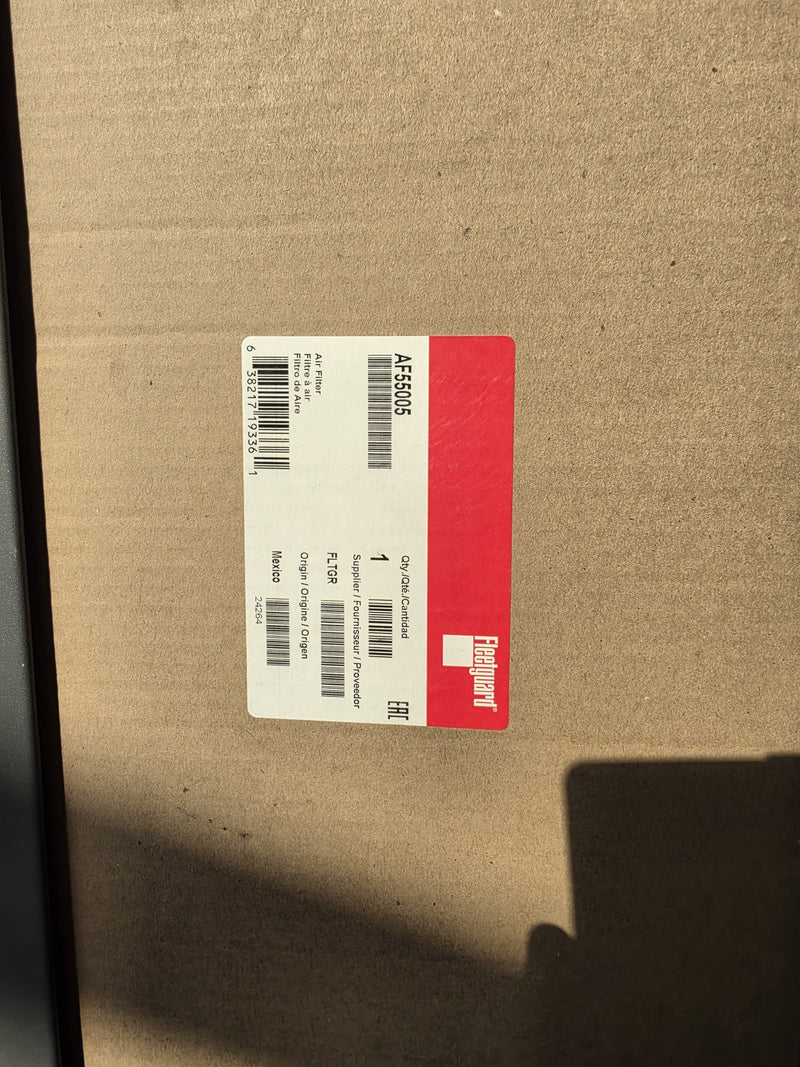 Genuine Fleetguard AF55005 air filter in a sealed carton photographed with the label sideways, origin Mexico date code 24264, in Prince George BC