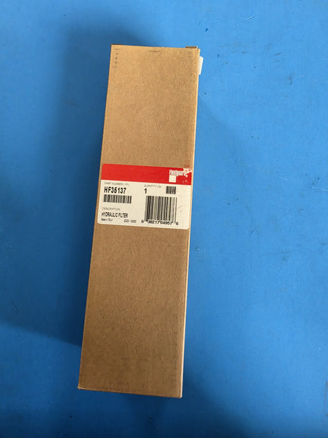 Genuine Fleetguard HF35137 hydraulic filter in a long slim sealed carton, made in Italy, UPC 638217049576, photographed in Prince George BC