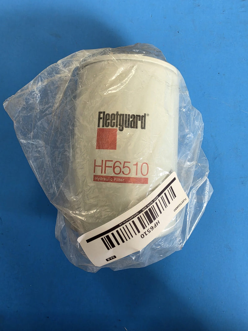 Genuine Fleetguard HF6510 hydraulic spin on filter, white can still in its factory bag, AIM S4-B shelf sticker, photographed in Prince George BC