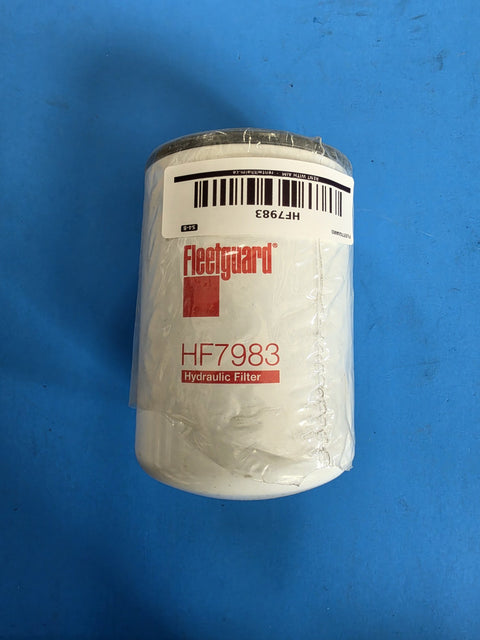 Genuine Fleetguard HF7983 hydraulic spin on filter, white can in a factory bag on rack S4-B, photographed in Prince George BC