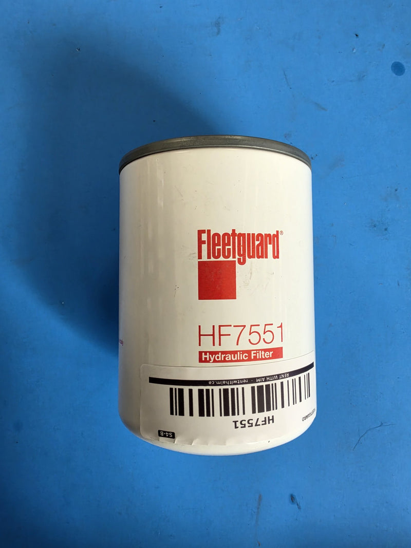 Genuine Fleetguard HF7551 hydraulic spin on filter, white can out of its bag on rack S4-B, photographed in Prince George BC