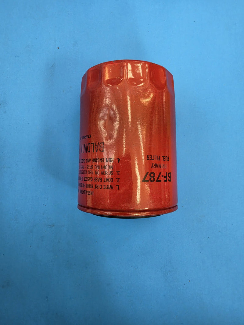 Genuine Baldwin BF-787 red primary fuel filter on the Prince George BC shelf