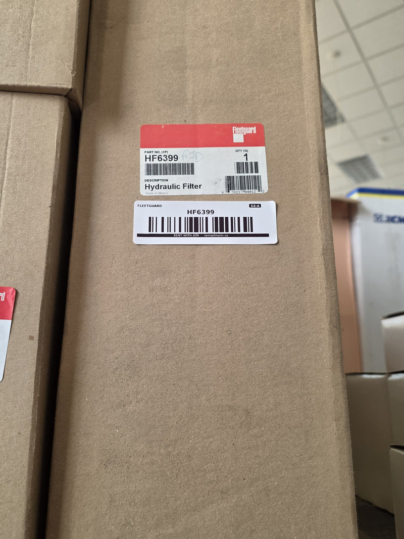 Genuine Fleetguard HF6399 hydraulic filter cartridge in a tall sealed carton, red label reading Hydraulic Filter made in Mexico, AIM Fleetguard barcode below, Prince George BC